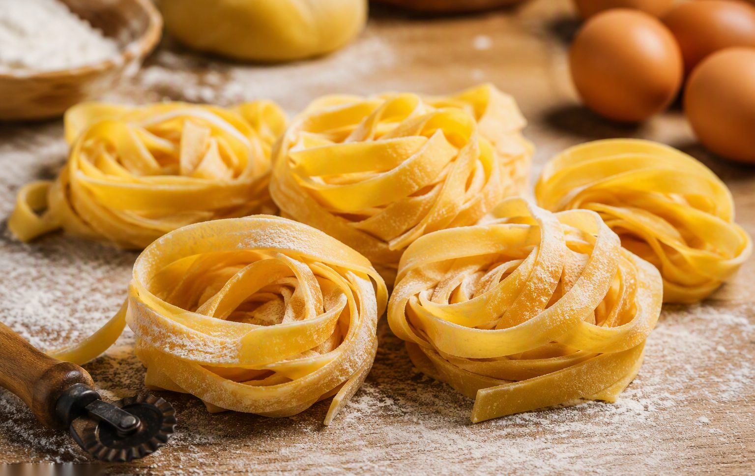 Illustrative image — Golden egg pasta strands drying on racks in an industrial pasta facility
